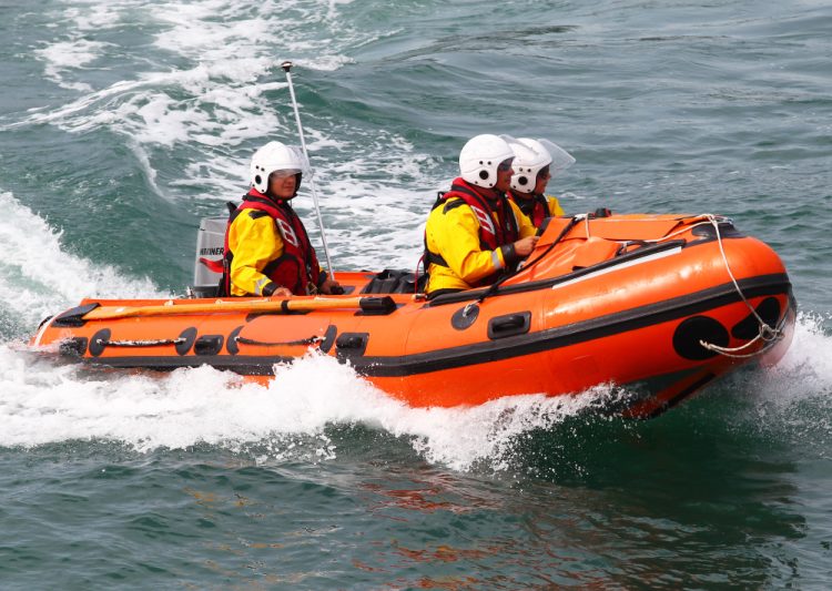 KAYAKERS STRANDED BY THE TIDE AT FRESHWATER RESCUED BY LIFEBOAT