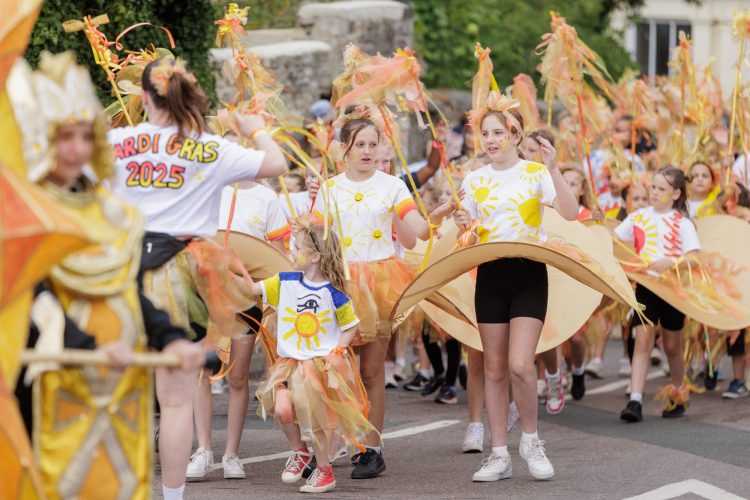 HUNDREDS LINE RYDE STREETS FOR COLOURFUL (AND DRY!) MARDI GRAS PARADE