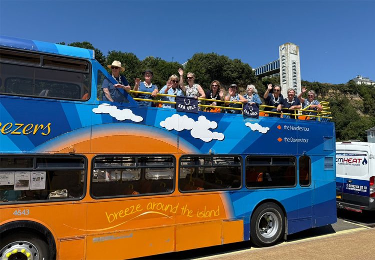 SEA GELS SHANTY BAND TOUR THE ISLAND IN VINTAGE BUS FOR MUSEUM FUNDRAISER