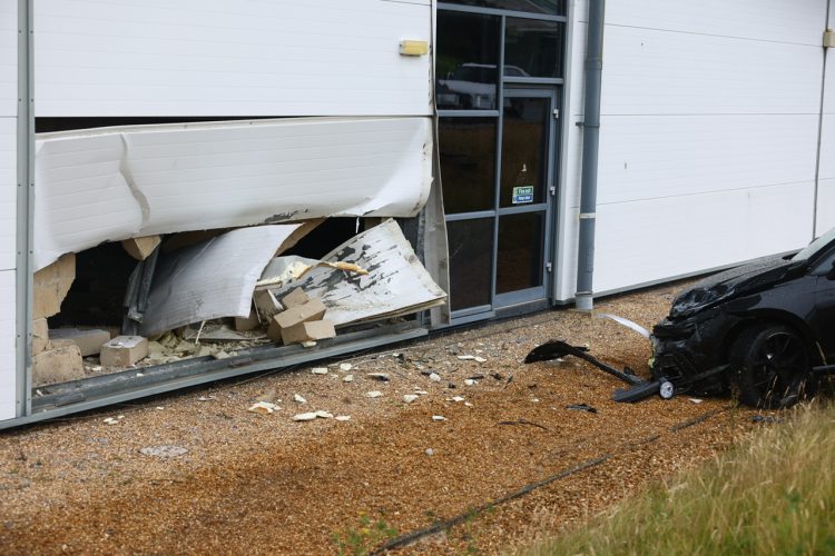 GOLF CAREERS INTO BUILDING LEAVING GAPING HOLE IN FORMER NEWPORT FACTORY