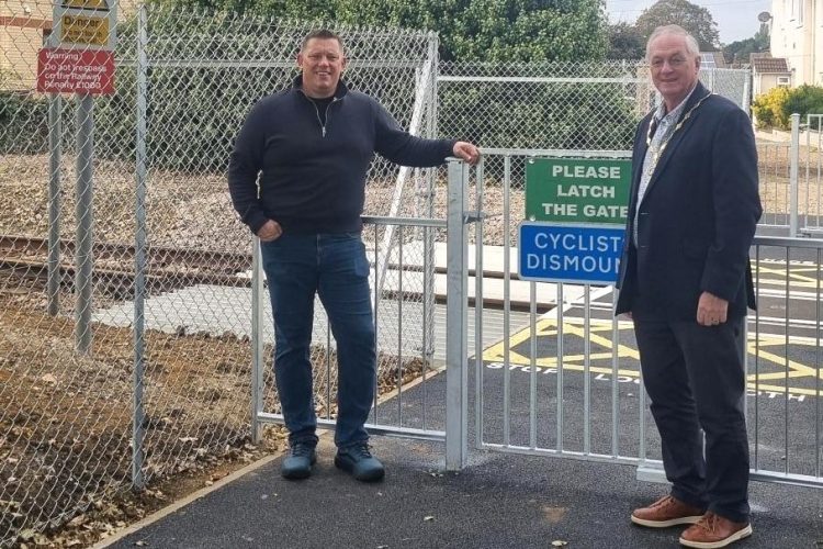 PARISH CELEBRATES RE-OPENING OF LAKE CLIFF GARDENS RAIL CROSSING