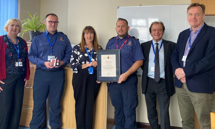 COUNCIL OFFICER HONOURED FOR 20 YEARS OF DEDICATED COASTGUARD SERVICE