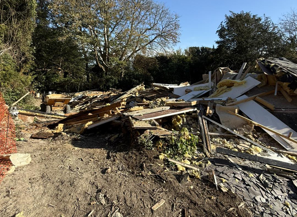 DAMAGED ST LAWRENCE HOME HIT BY LANDSLIDE DEMOLISHED AND SITE RETURNED TO NATURE