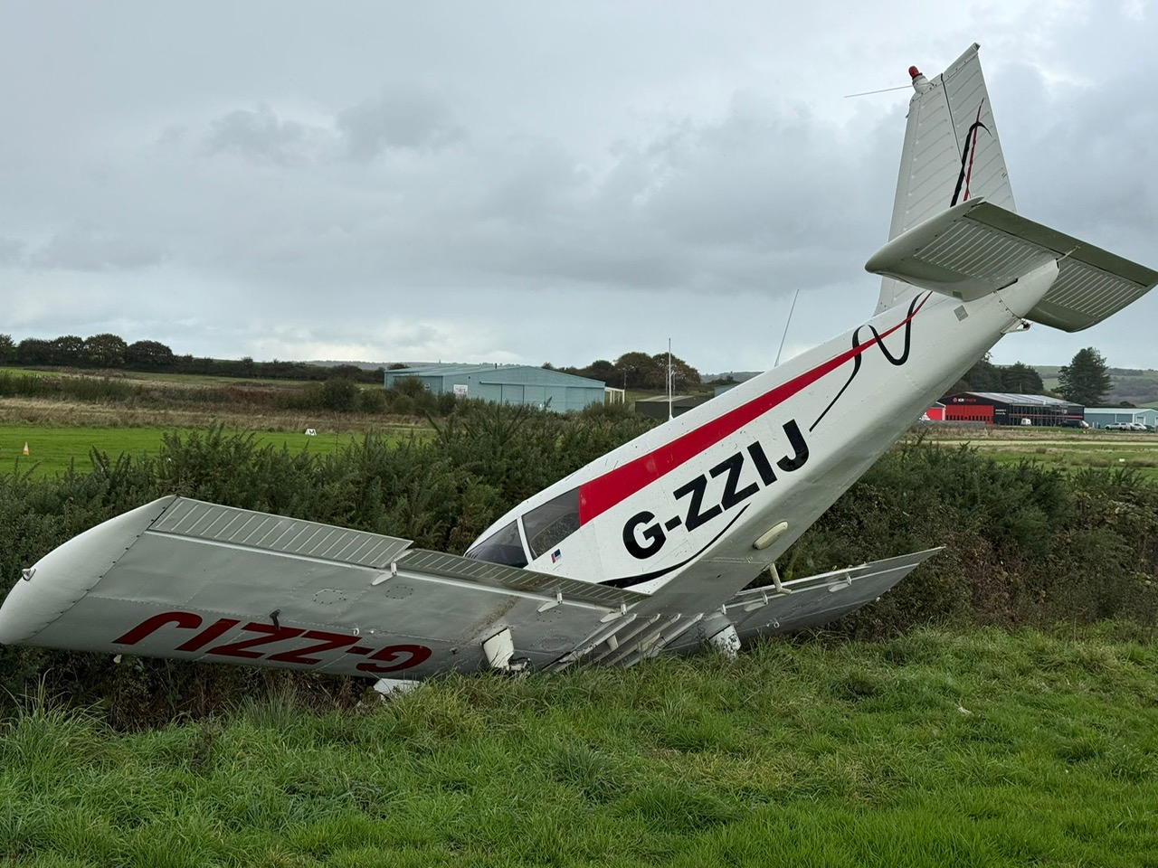 PLANE LEFT NOSEDOWN IN DITCH AT SANDOWN AIRPORT
