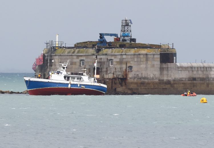 LIFEBOATS LAUNCHED AS LONE SAILOR AND DOG GO AGROUND ON TRAWLER