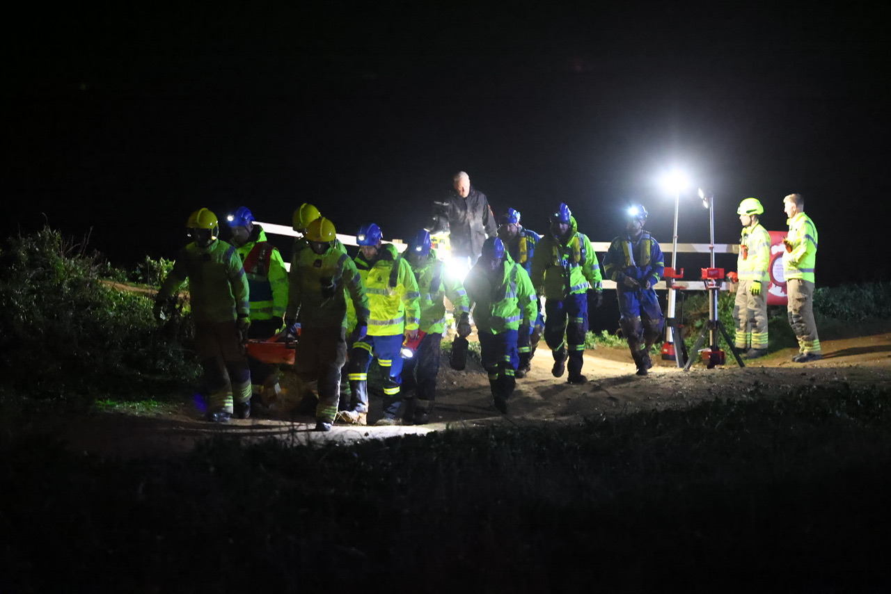 RESCUE OP AS PAIR BECOME STUCK IN THE MUD AT COMPTON