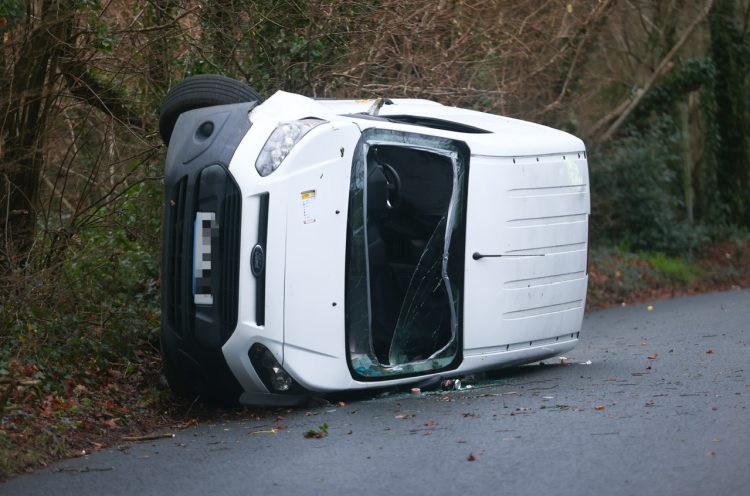 UPDATED: VAN CLIPS TREE AND ROLLS CLOSING BUSY RURAL LANE