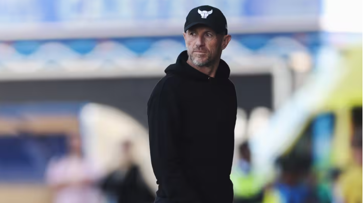 OXFORD UNITED PART COMPANY WITH HEAD COACH GARY ROWETT