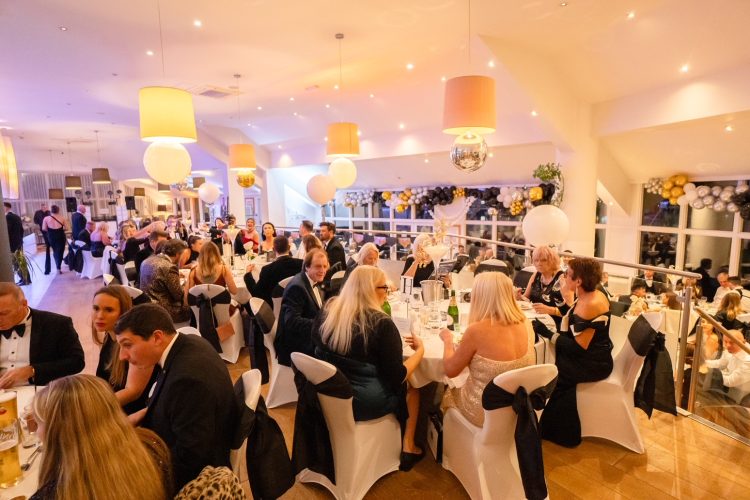 JAMES BOND THEMED BALL SEES RYDE ROUND TABLE RAISE £16,000 FOR DUO OF CHARITIES
