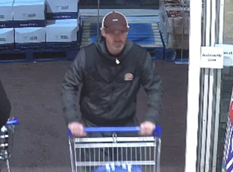 MAN WANTED AFTER SPIRITS STOLEN IN £300 SHOPLIFTING INCIDENT AT TESCO EXTRA