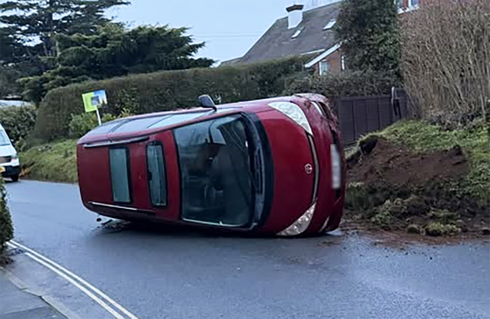 DRIVER FLEES SCENE AFTER ROLLING CAR ONTO SIDE IN NEWCHURCH