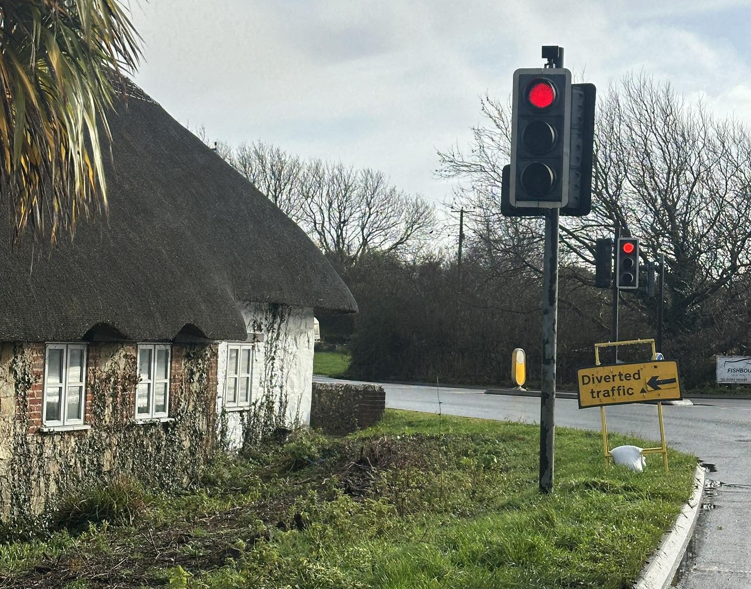 TROUBLESOME TEMPORARY TRAFFIC LIGHTS AT DOWNEND FINALLY REMOVED