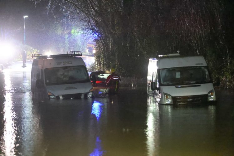 MOTORISTS RESCUED AS THREE VEHICLES BECOME STRANDED IN DEEP FLOOD WATER