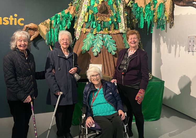 CARE HOME RESIDENTS AMAZED BY COLOURFUL CARNIVAL COSTUME DISPLAY IN NEWPORT