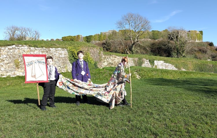 COAT OF HOPES TAKEN TO CARISBROOKE CASTLE BY CHRIST THE KING COLLEGE STUDENTS