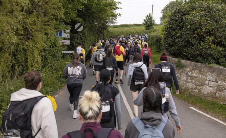 MIXED WEATHER BUT SMILES ALL ROUND AS WALK THE WIGHT RETURNS