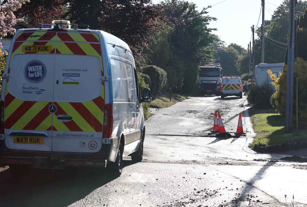 SEWAGE FLOODS EAST COWES STREETS AFTER MAINS BURST LIFTS ROAD SURFACE