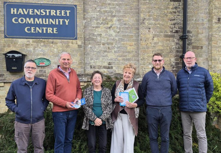 AWARD-WINNING READING VOLUNTEER BACKS PRIMARY SCHOOL BOOK BAG INITIATIVE