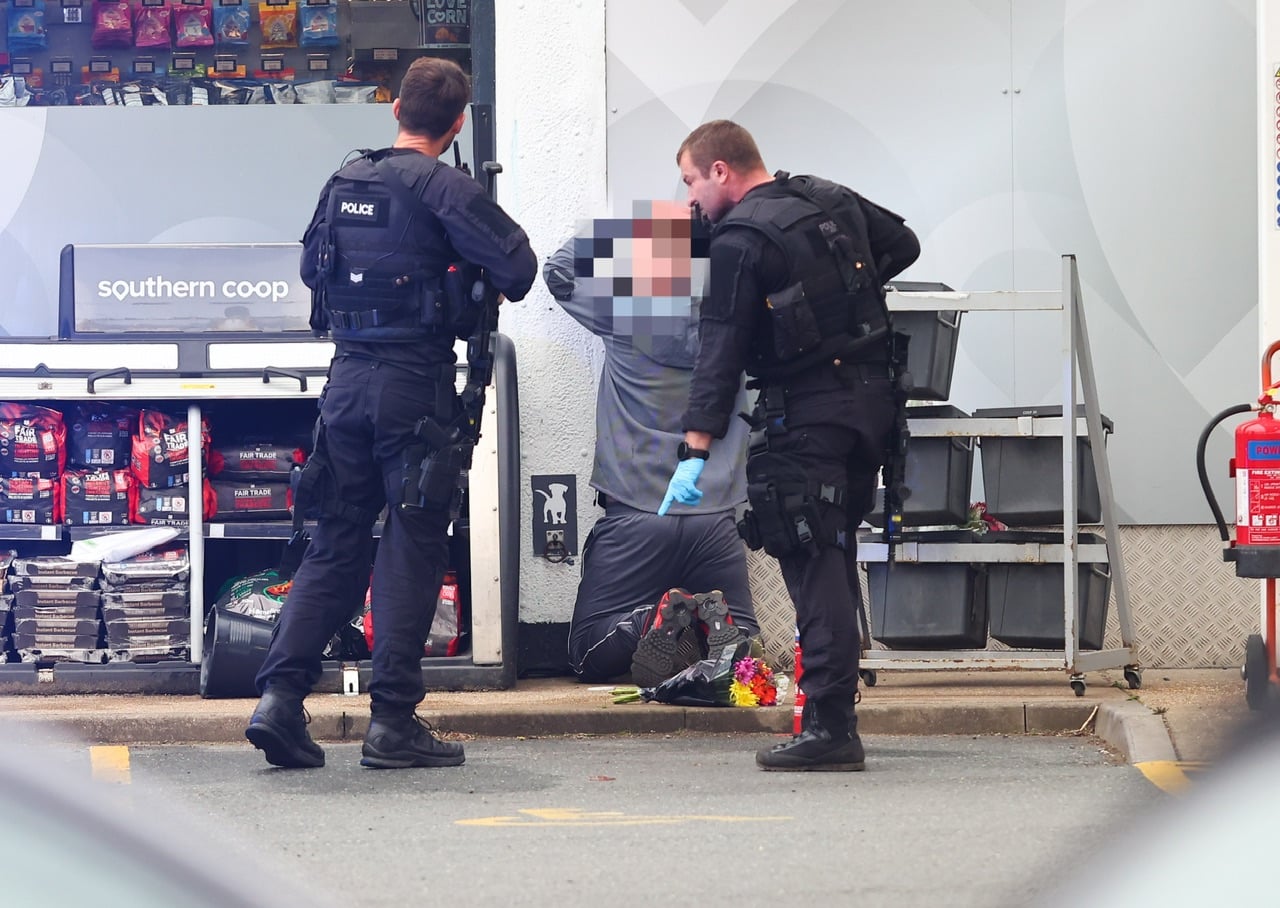 POLICE NEGOTIATING WITH ARMED MAN IN PETROL STATION DRAMA