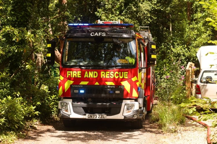 WATER CARRIER CALLED IN AS TREE BLAZE THREATENS WOODLAND IN BINSTEAD