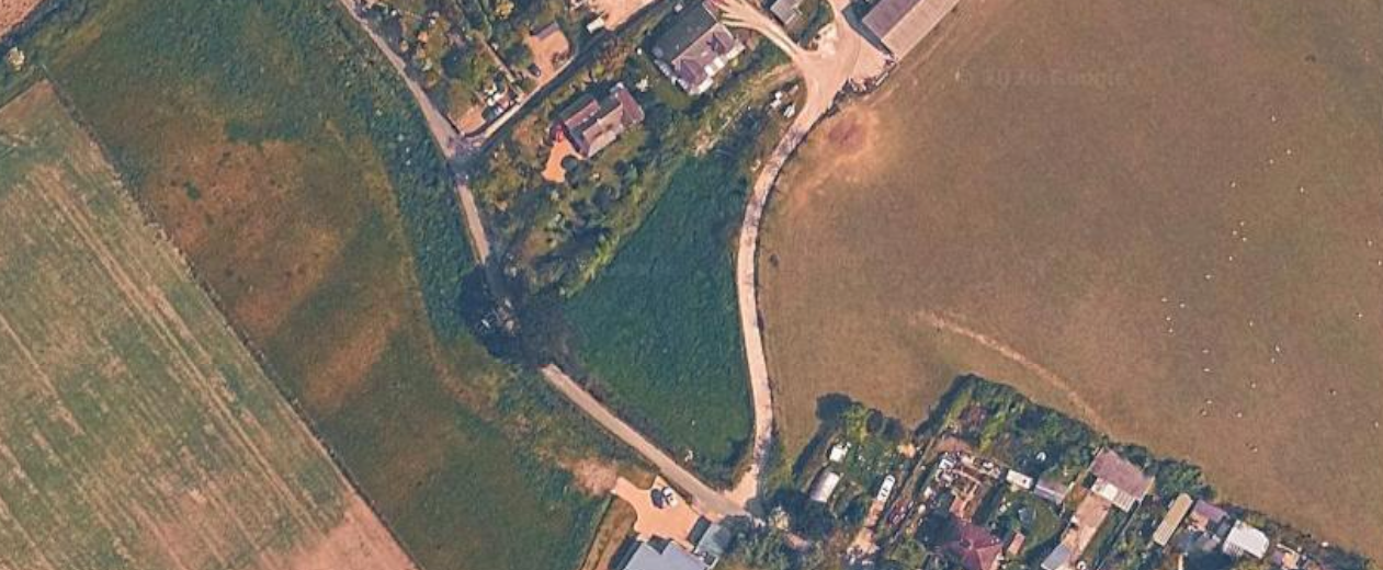 BID FOR 3 HOMES ON GREENFIELD SITE WINS SUPPORT DESPITE ISLAND ROADS OBJECTION