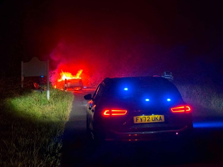 LATE-NIGHT CAR FIRE BLOCKS RURAL ROAD NEAR BRIGHSTONE