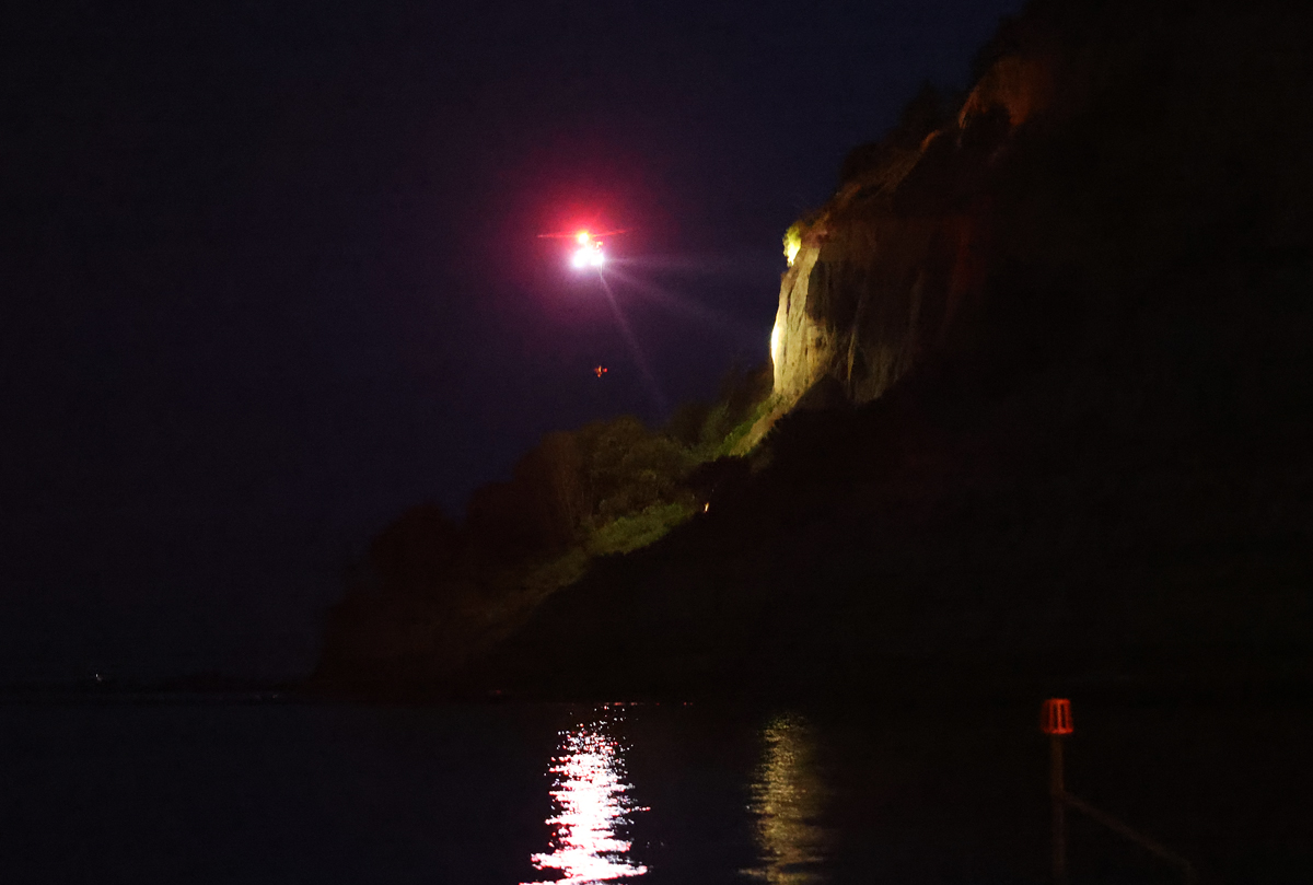 CLIFF SIDE RESCUE TO FREE YOUNG MALE FROM PRECARIOUS POSITION