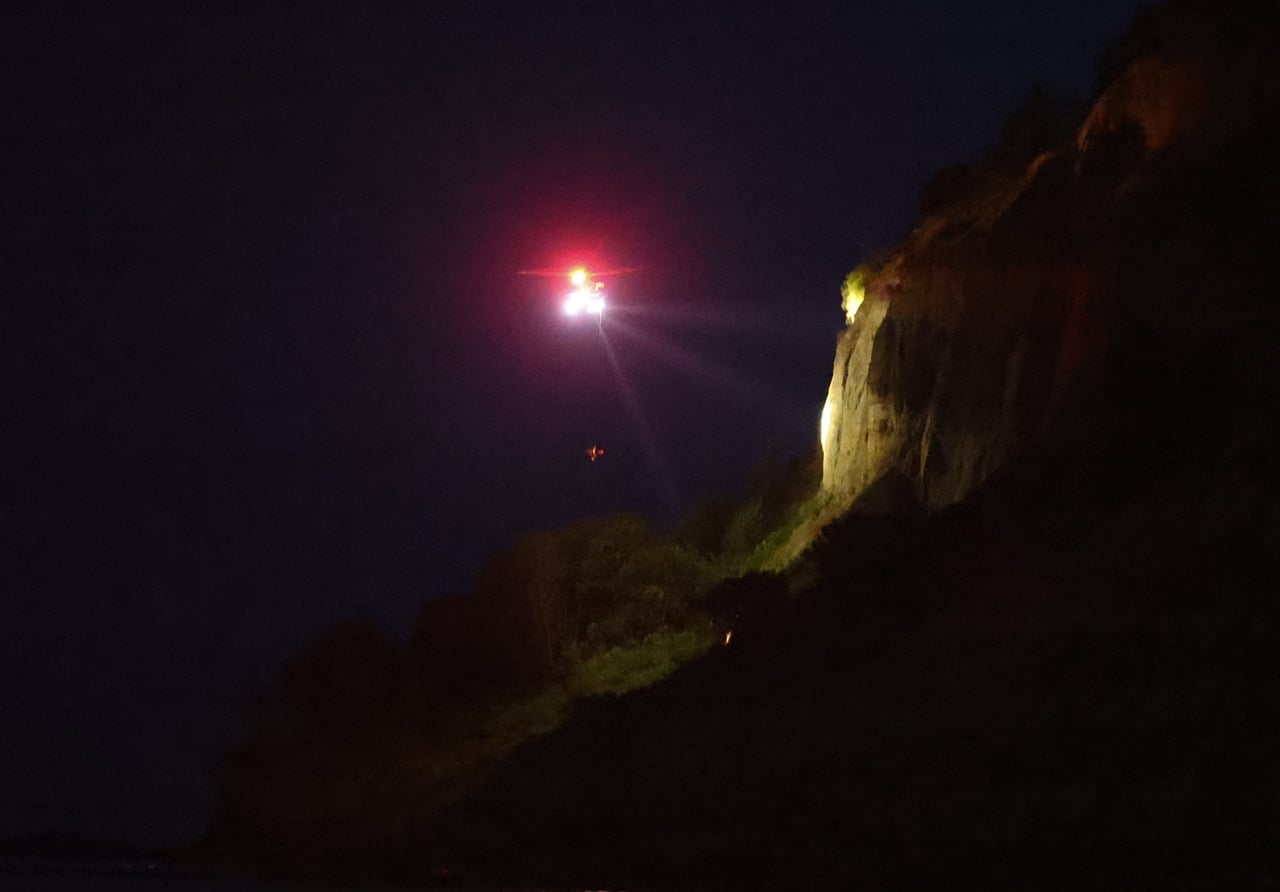 CLIFF SIDE RESCUE TO FREE YOUNG MALE FROM PRECARIOUS POSITION