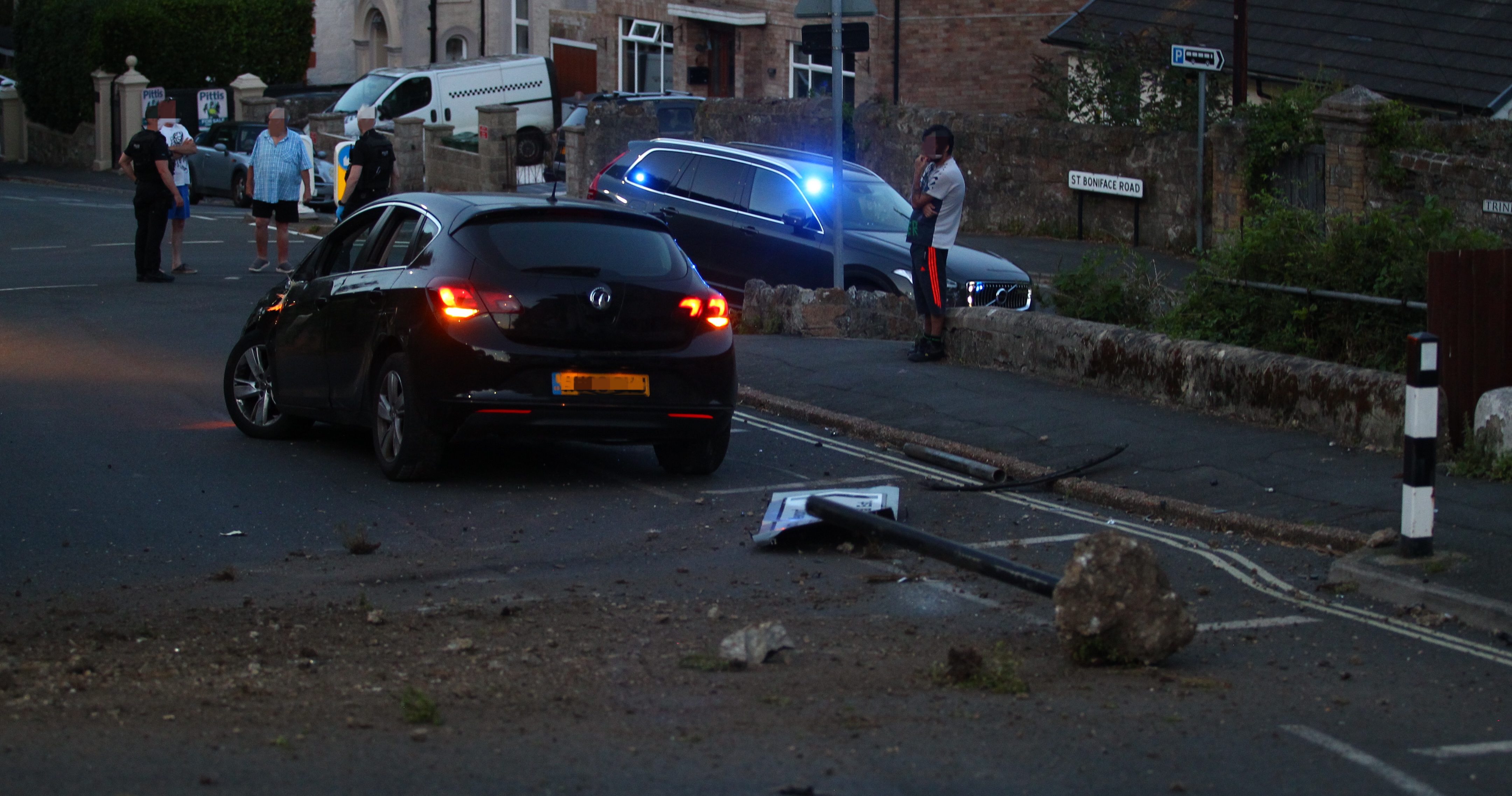 DRIVER FLEES AFTER CAR HITS SIGN AND SPINS