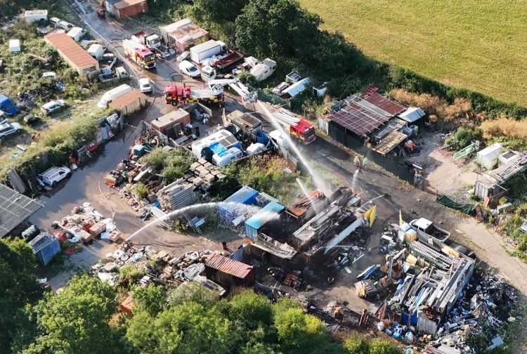 8 SHIPPING CONTAINERS STILL BEING COOLED AS RYDE SCRAPYARD FIRE ENTERS SECOND DAY