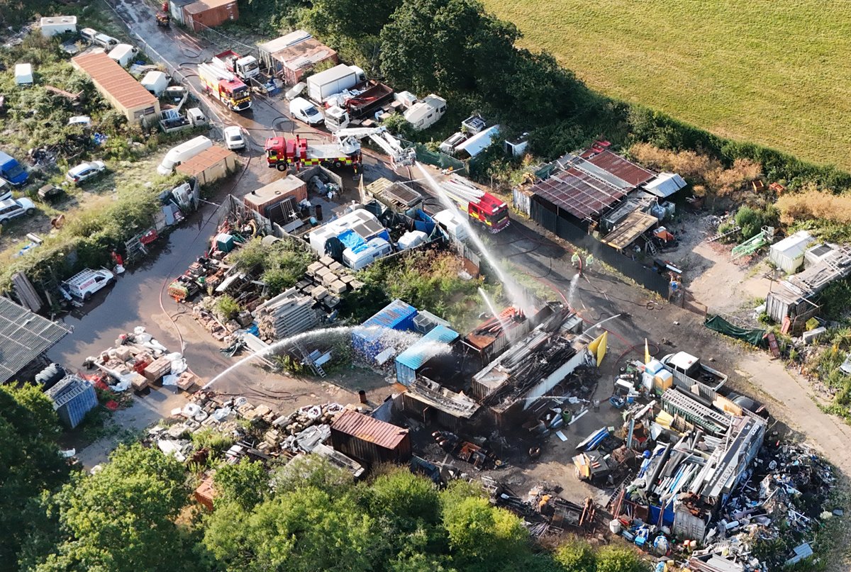 8 SHIPPING CONTAINERS STILL BEING COOLED AS RYDE SCRAPYARD FIRE ENTERS SECOND DAY
