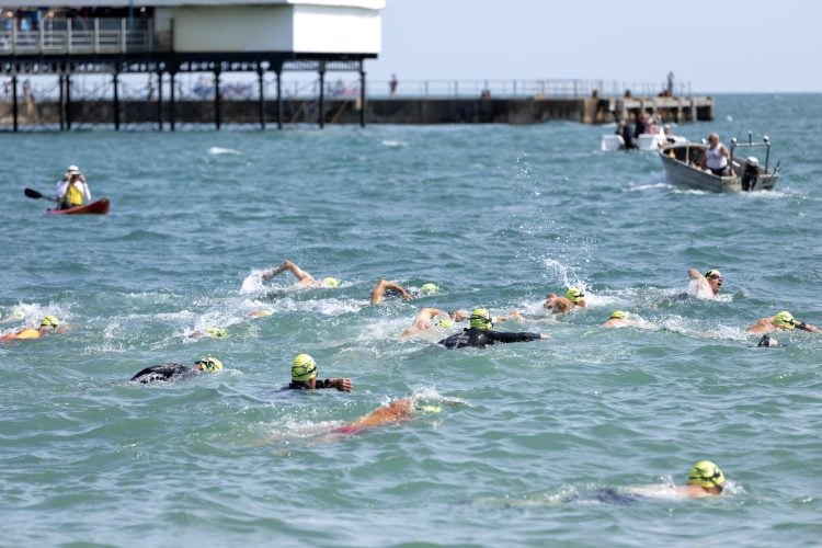 PHOTOS: SWIMMERS MAKE A SPLASH IN ANNUAL PIER2PIER SEA SWIM ACROSS THE BAY