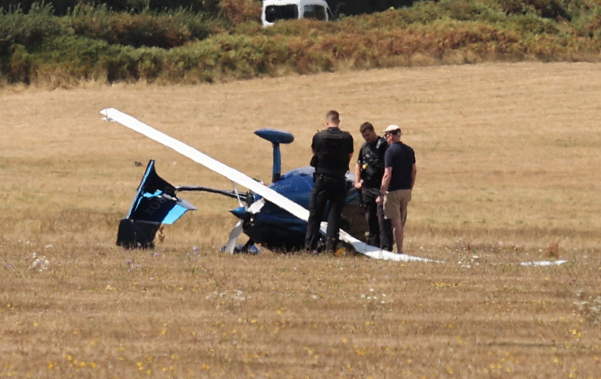 MIRACULOUS ESCAPE AS GYROCOPTER ENDS UPSIDE DOWN IN BIZZARE RUNWAY FLIP